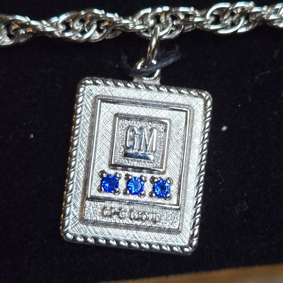 GM motors Jewelry - Sapphire 10k white gold charm & 12k rope bracelet GM motors 15year gift